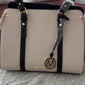 Elegant Cream and Black Satchel with Gold Details